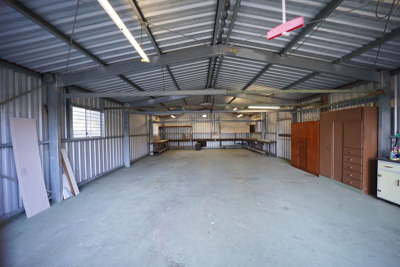 Industrial building interior with a concrete floor (stock photo)
