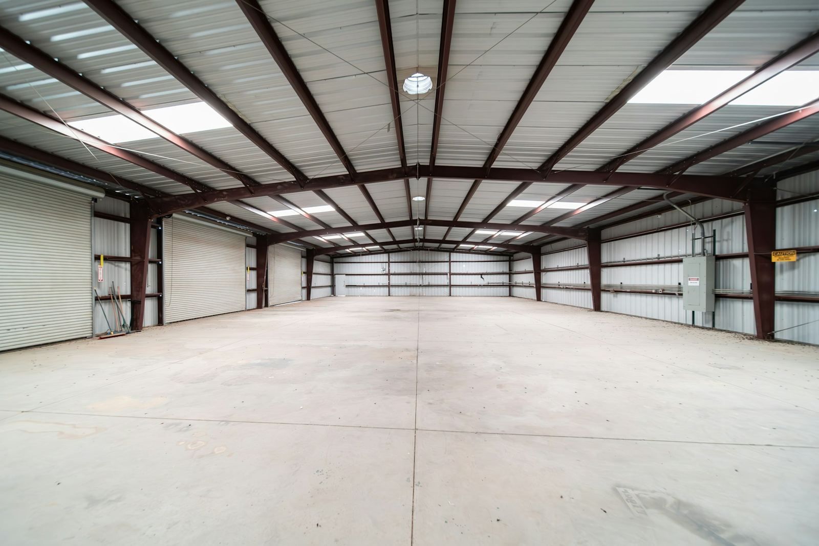 Empty warehouse with a concrete slab floor (stock photo)